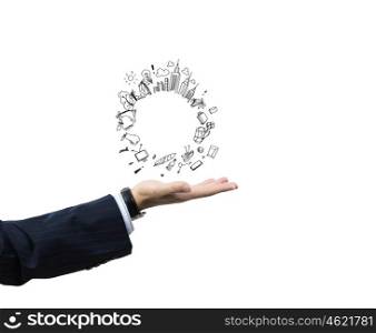 Construction concept. Close up of businessman hand holding sketches of buildings