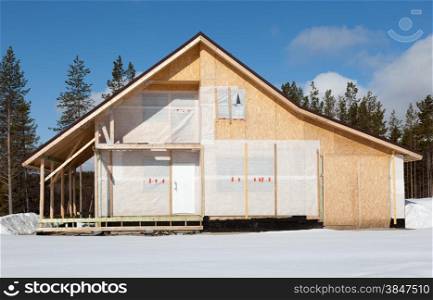 Construction cottage in the forest area in the pine forest
