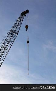 Construction crane by twilight