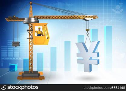 Construction crane lifting yen in currency business concept