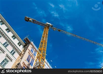 Construction crane next to the building