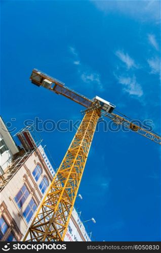 Construction crane next to the building