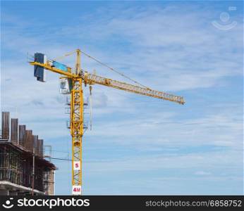 construction crane of building industry with blue sky background