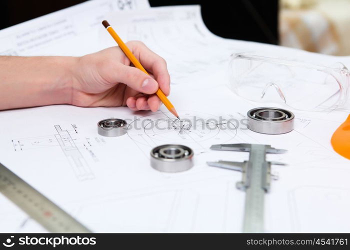 construction drafts and tools on the table