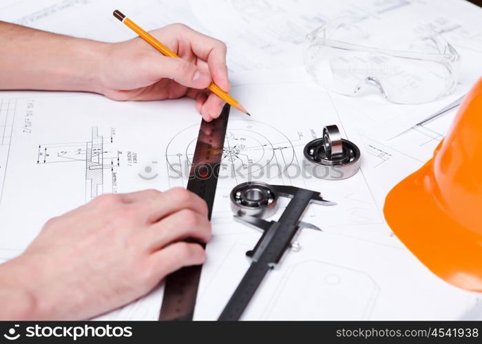 construction drafts and tools on the table