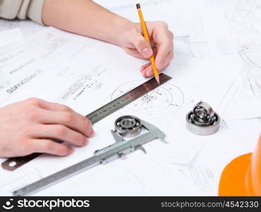 construction drafts and tools on the table