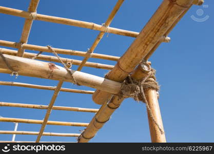 construction elements truss of bamboo and ropes. bamboo trellis