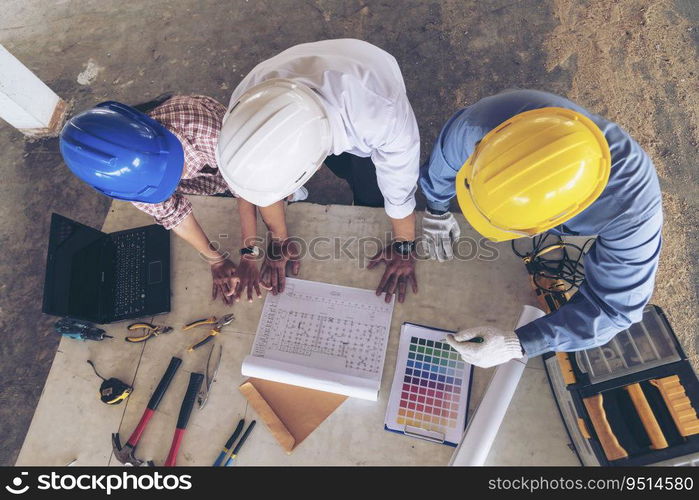 Construction engineer teamwork Safety Suit Trust Team Holding White Yellow Safety hard hat Security Equipment on Construction Site. Hardhat Protect Head for Civil Construction Engineer Concept