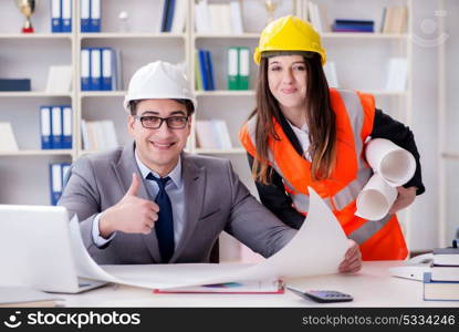 Construction foreman supervisor reviewing drawings