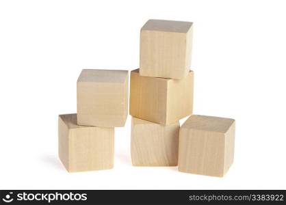 construction from wooden cubes. It is isolated on a white background