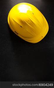 construction helmet on black background