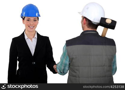 Construction manager and worker