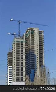 Construction of many storeyed building in different readiness and jib-crane