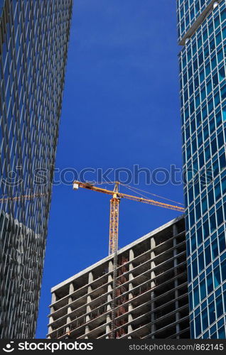 Construction of new building in business district.