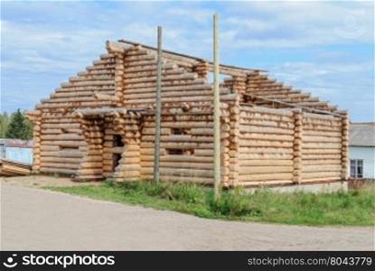 Construction of new log house in russian country, Vologda region