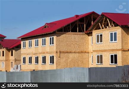 Construction of new two-storey houses made of wood