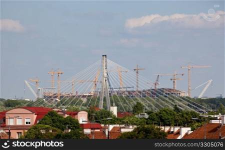 Construction of soccer stadium in Warsaw Poland behind the Syrena bridge