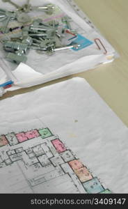 Construction Plan and keys on the table