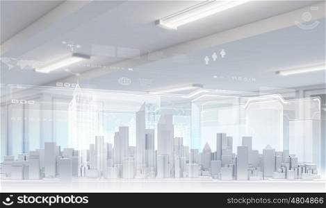 Construction project. Conceptual image with construction model of buildings on table