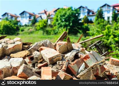 Construction site. Closeup of stack of old grunge destroyed damaged bricks. Industry.