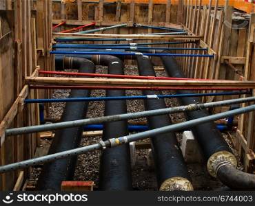 construction site, construction pit. construction site, pit with long distance heating pipes