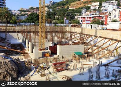 Construction site for equipping the foundation of a modern building. The concept of urban planning. Budva. Montenegro.. Construction site for the equip of the foundation of a modern building