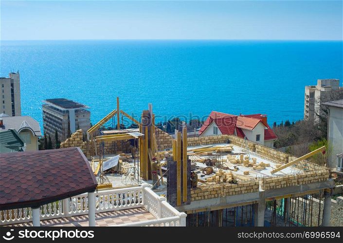 Construction site of building in front of the sea. Crimea, Ukraine