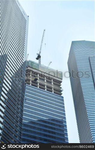 Construction site of modern skyscraper in Singapore