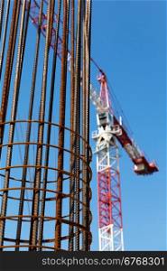 Construction site. Steel reinforcement. Building crane.