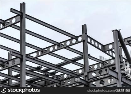 Construction site. Steel structure metal girders skeleton of a new modern building