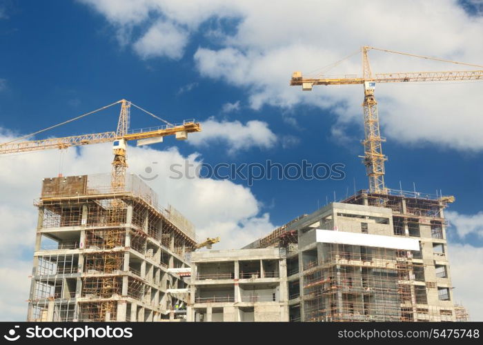 Construction site with crane and building