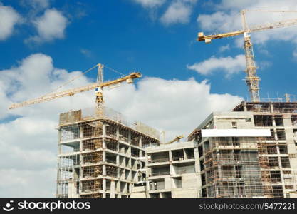 Construction site with crane and building