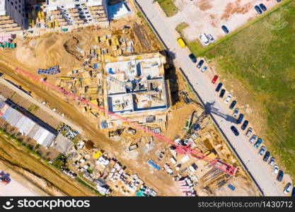 Construction site with cranes. Construction workers are building.Aerial view.Top view.