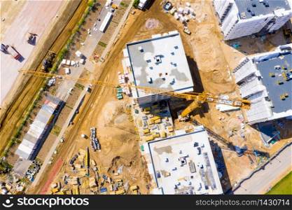 Construction site with cranes. Construction workers are building.Aerial view.Top view.