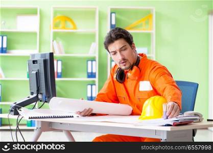 Construction supervisor planning new project in office