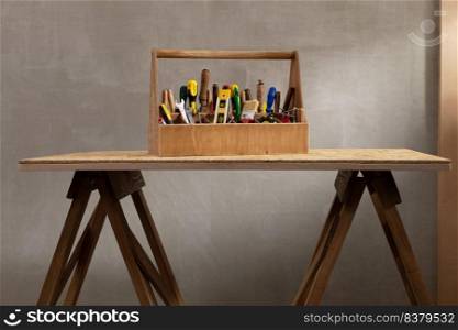 Construction tools and toolbox on wooden table background texture. Tools kit and tool box