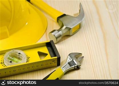 construction tools on wooden table