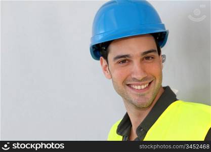 Construction trainee with security helmet