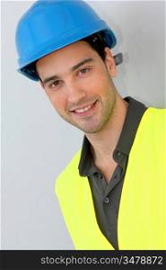Construction trainee with security helmet