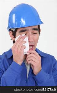 Construction worker crying