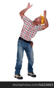 Construction worker holding empty copy space