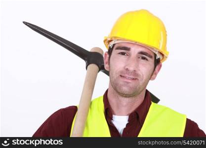 Construction worker holding pick-Axe