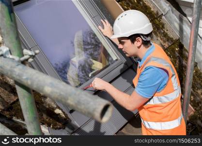 Construction Worker Installing Replacement Window