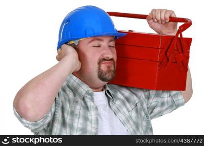 Construction worker listening to the sweet sounds of his toolbox
