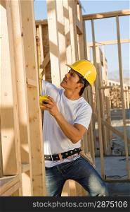 Construction worker on scaffoldings