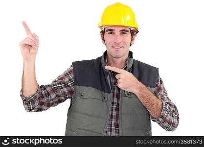 Construction worker pointing