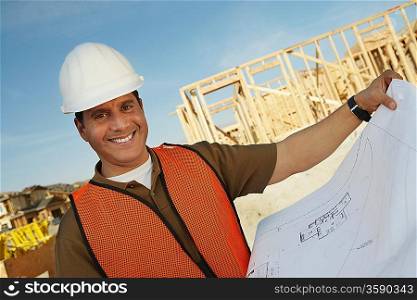 Construction Worker Reading Blueprints