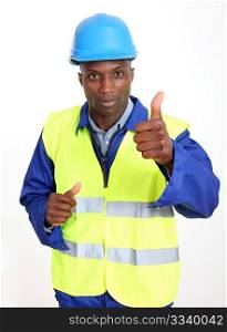 Construction worker showing thumb up
