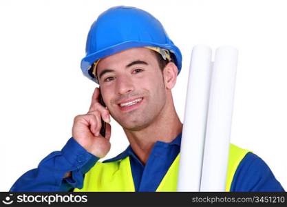 Construction worker talking on the phone