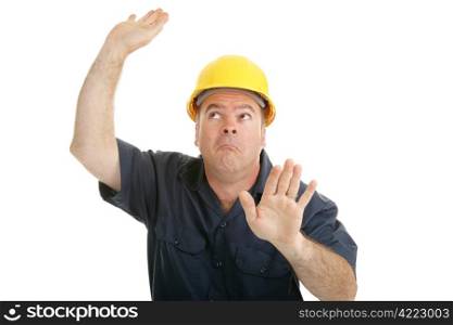 Construction worker trapped in invisible box. Isolated on white.
